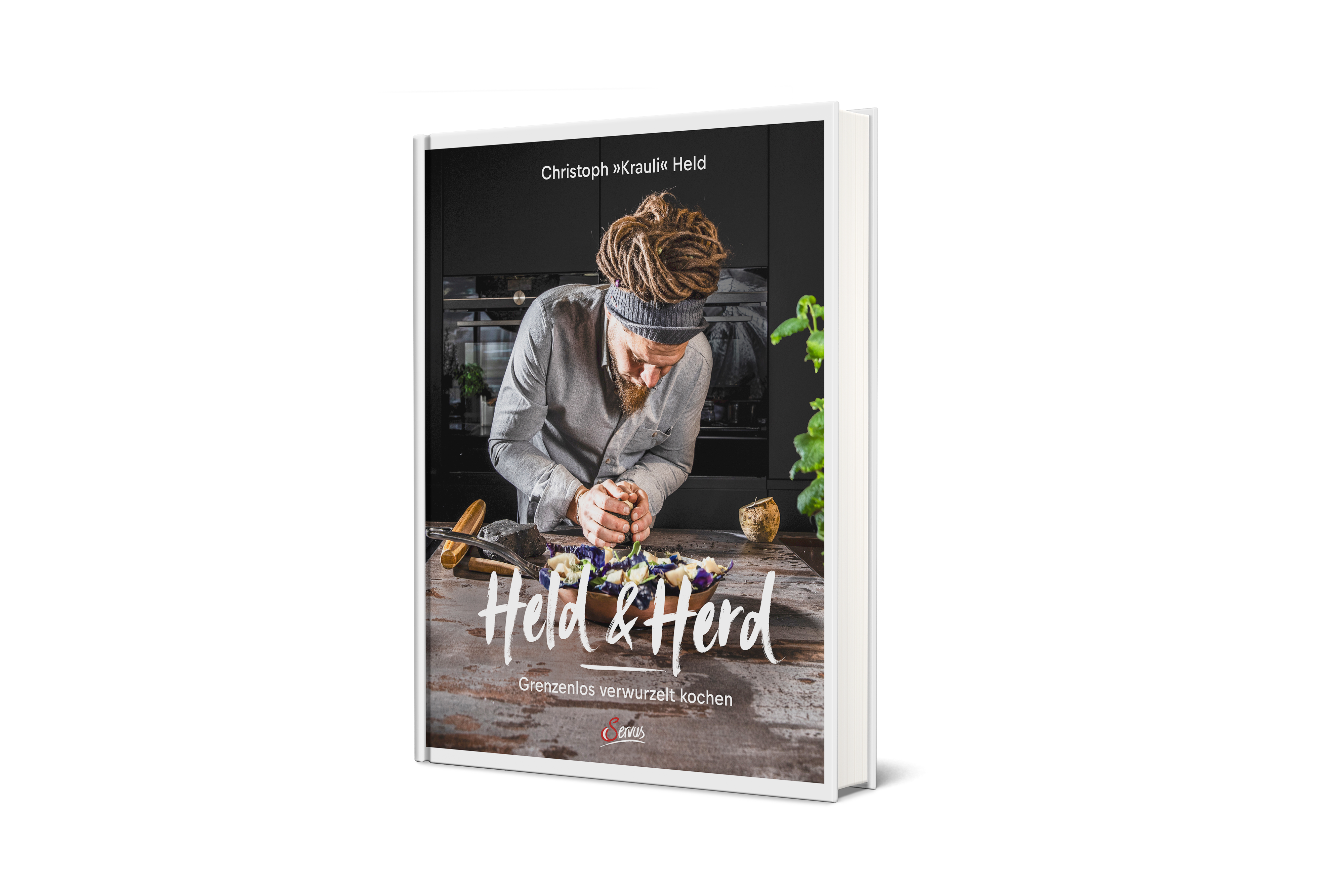 Das Buch "Held & Herd" von Christoph "Krauli" Held stehend