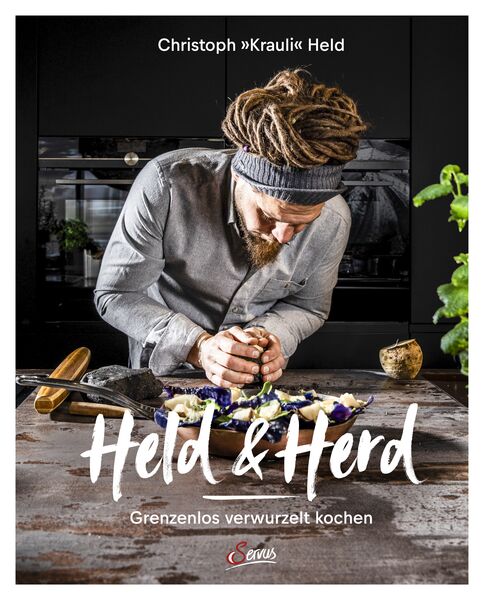 Das Cover des Buches "Held & Herd" von Christoph "Krauli" Held, es bildet Christoph "Krauli" Held beim Kochen ab